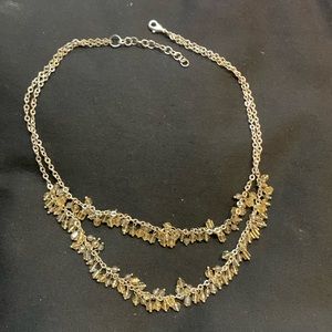 16 inch silver necklace. Double row of chain with clear, small decoration.